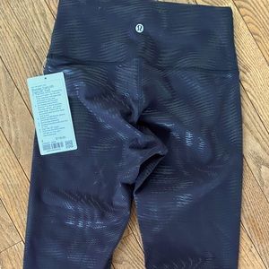 Lululemon wunder train high rise right 25” shapeshifter black foil size 6